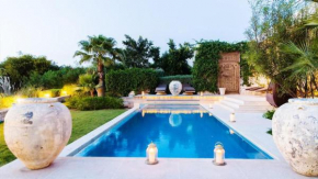 Villa luxeuse et climatisee sur le golf, piscine chauffee